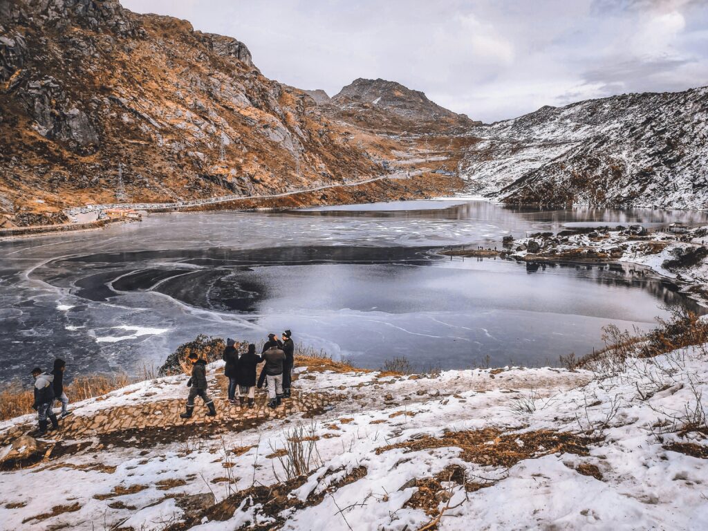 People Near Lake at Winter Looking at View